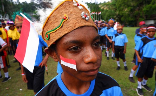 Lomba Gerak Jalan Tingkat Pelajar Papua Peringati HUT RI 0 Foto