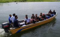 Ojek Perahu Danau Sentani Papua untuk Berpegian ke Daearah Lain