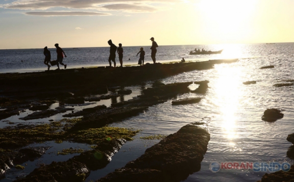 Menikmati Suasana Sunset Di Pantai Kuri Sulawesi Selatan 0 Foto Okezone Economy