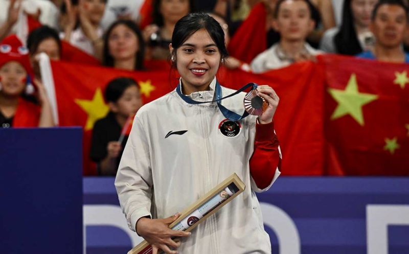 Senyum Gregoria Mariska Tunjung Sumbang Medali Pertama untuk Indonesia