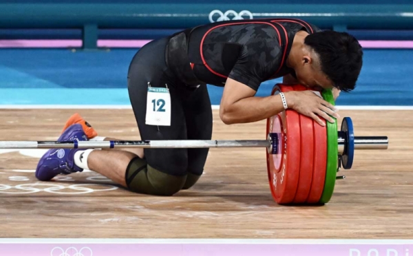 Cetak Sejarah Baru, Lifter Rizki Juniansyah Raih Emas Olimpiade 2024